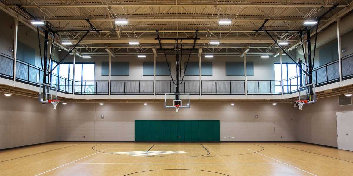 Industrial high-bay LED gymnasium lighting and sports facility electrical outfitting by Fountain Electric at NCSSM Morganton.