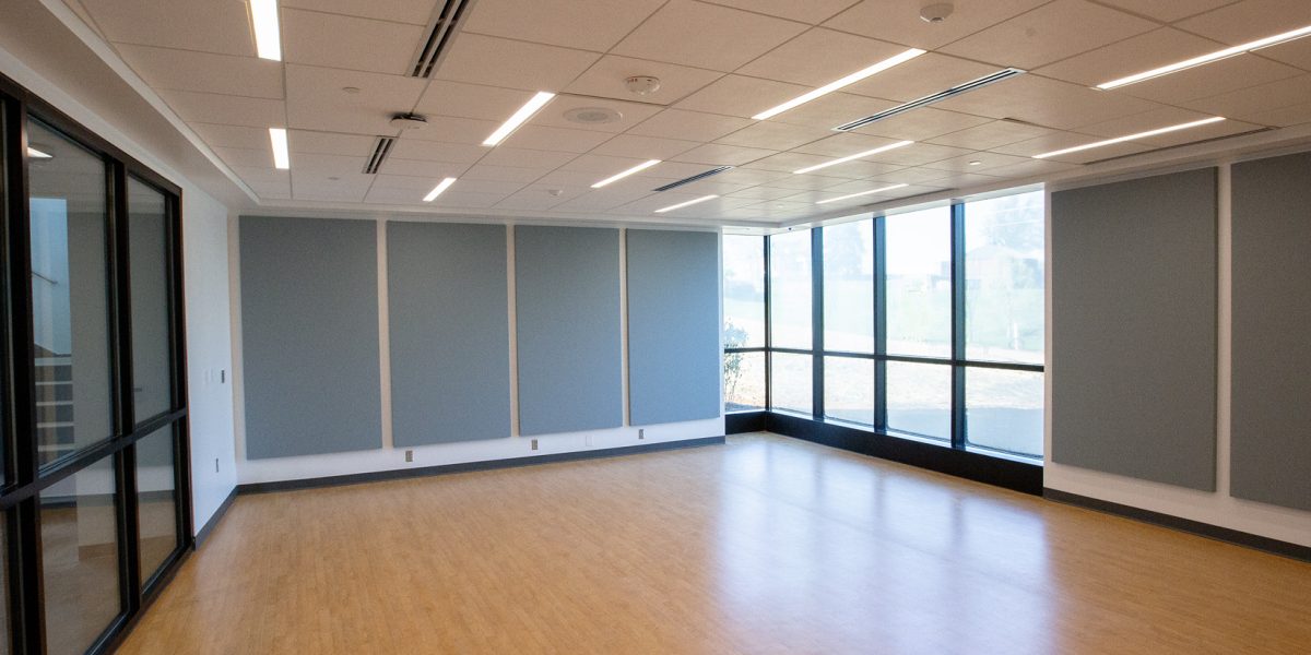 Linear recessed ceiling lighting and electrical outfitting for a multipurpose room at NCSSM Morganton by Fountain Electric.